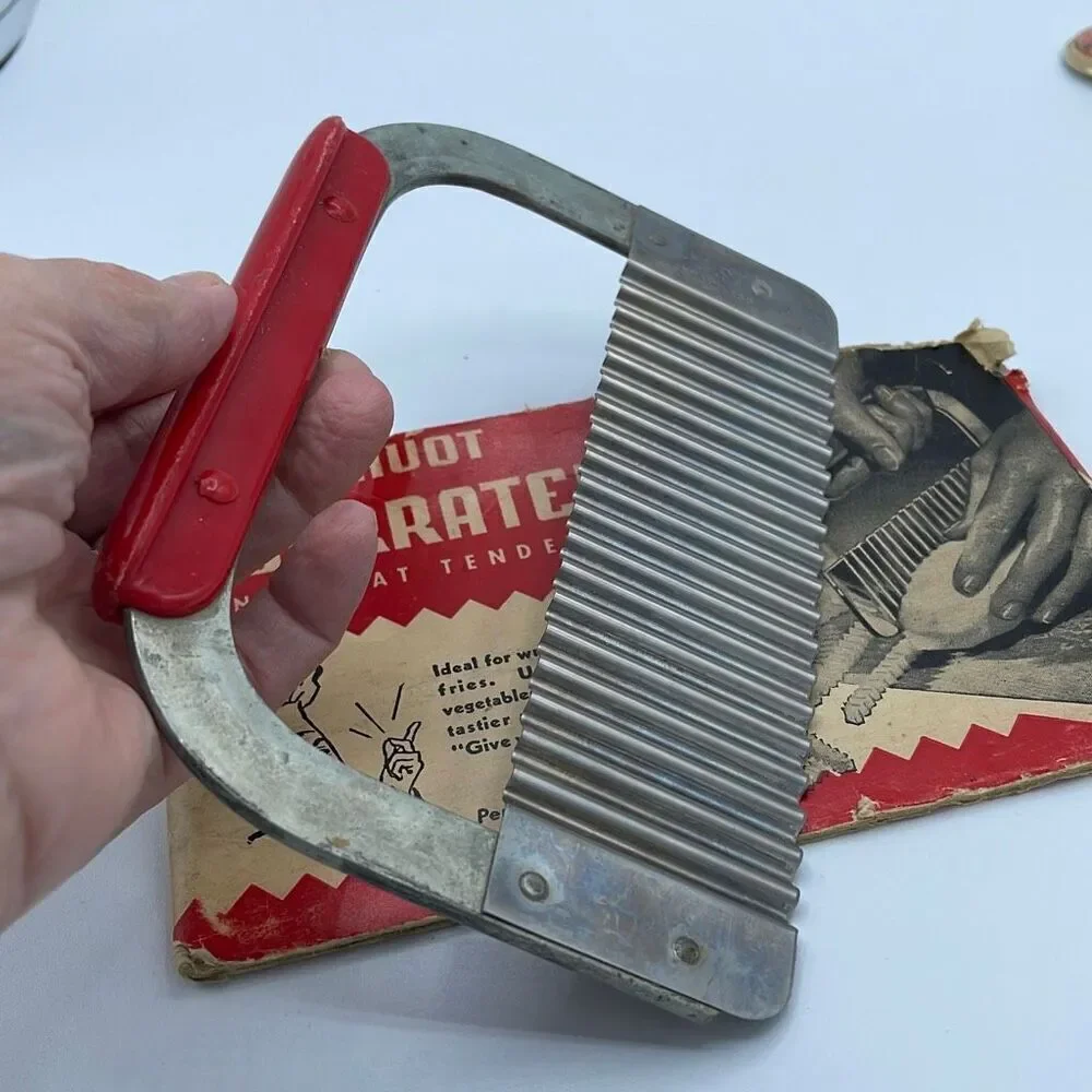 Vintage Huot Serrater and meat tenderizer in original packaging.